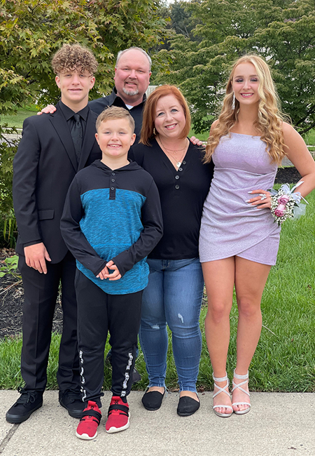 Family portrait on Homecoming: Derek Gould, his wife, and three children.